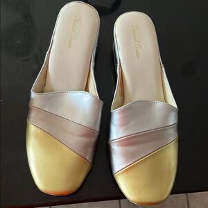 Elegant Silver and Gold Mules with Modern Crossover Design Daniel green